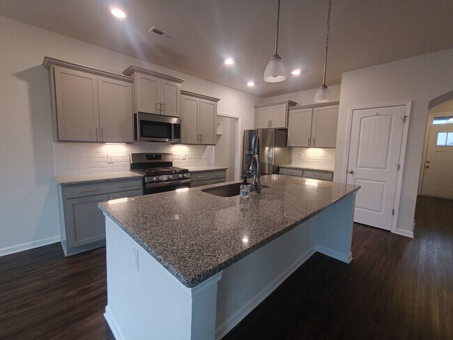 Building Photo - Fabulous Roomy two story house with room to roam