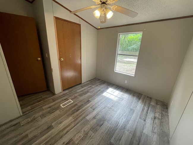 Building Photo - Looking for Acreage? This updated 3 bed, 2 bath home with an inside laundry room sits on 1.5 Acre...