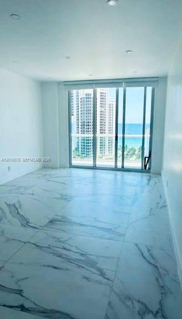 Building Photo - 19370 Collins Ave
