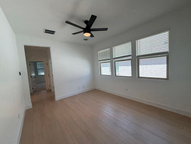 Building Photo - Move-in ready and like-new! Washer, dryer, and refrigerator Included.