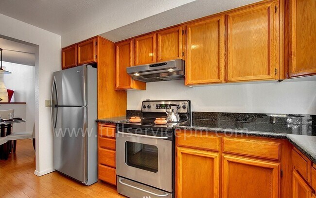 Building Photo - View Townhome Overlooking Genesee Park, Private Patio, Decks & Garage Parking