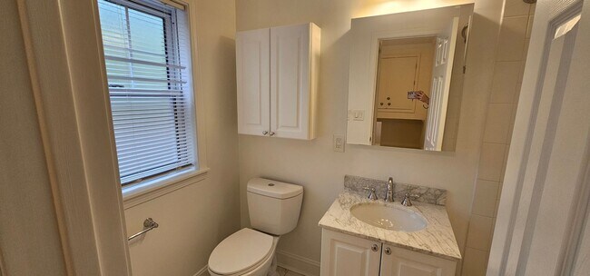 Building Photo - Spacious 2-bedroom townhouse on beautifully landscaped grounds.