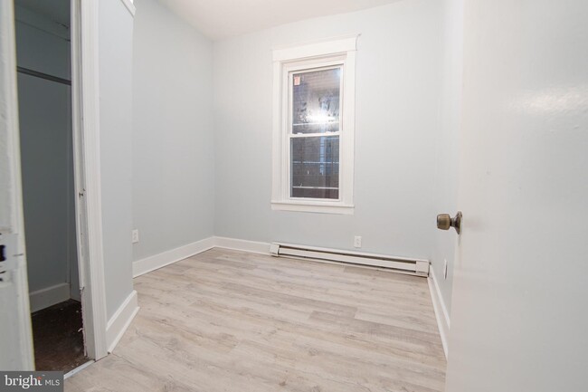 Building Photo - 7022 Woodland Ave