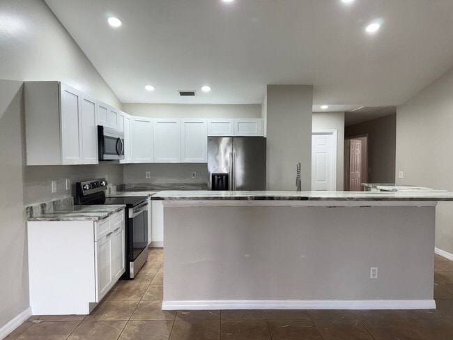 Building Photo - Experience this Cape Coral 3 bedroom 2 bat...