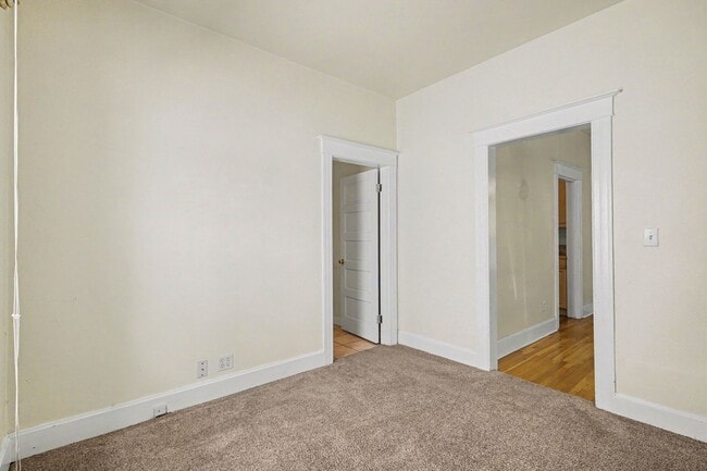 Building Photo - Beautifully Preserved Englewood Home with Fenced Backyard