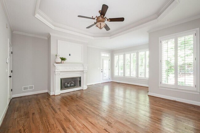 Building Photo - Elegant Master-on-Main in Prestigious Laur...