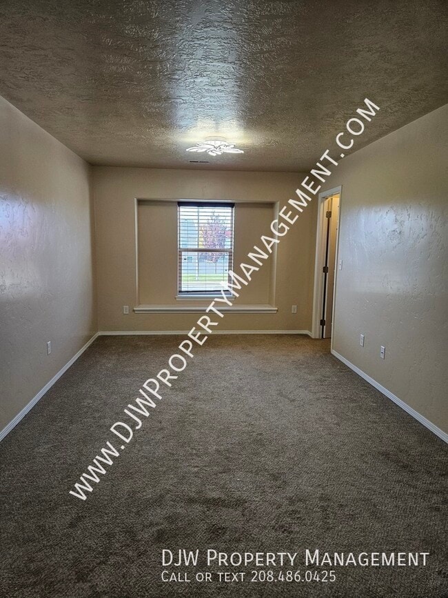 Building Photo - 4665 N Beaham Ave