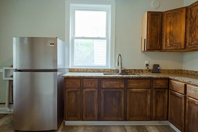 Building Photo - 6633 S Campbell Ave