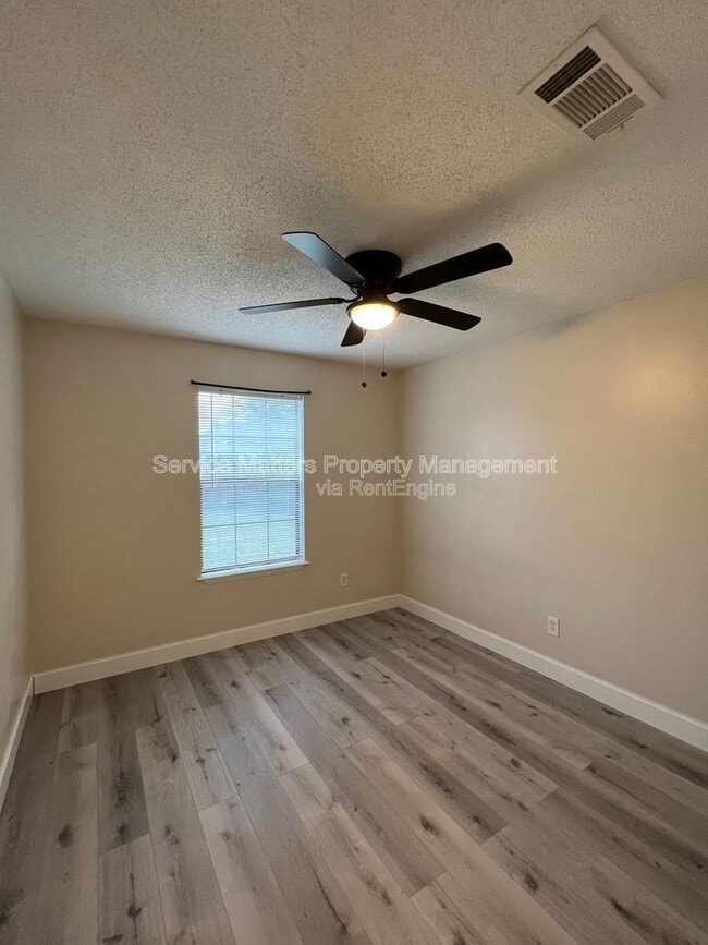 Building Photo - 7777 Needlerush Dr