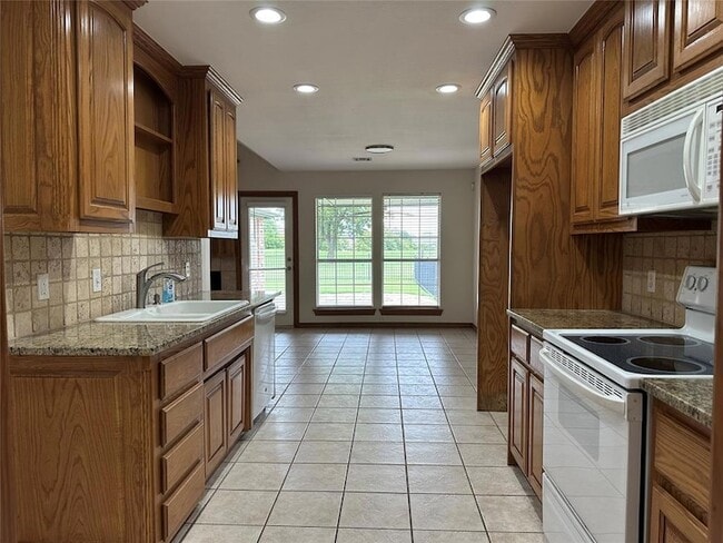 Building Photo - 15713 Traditions Blvd