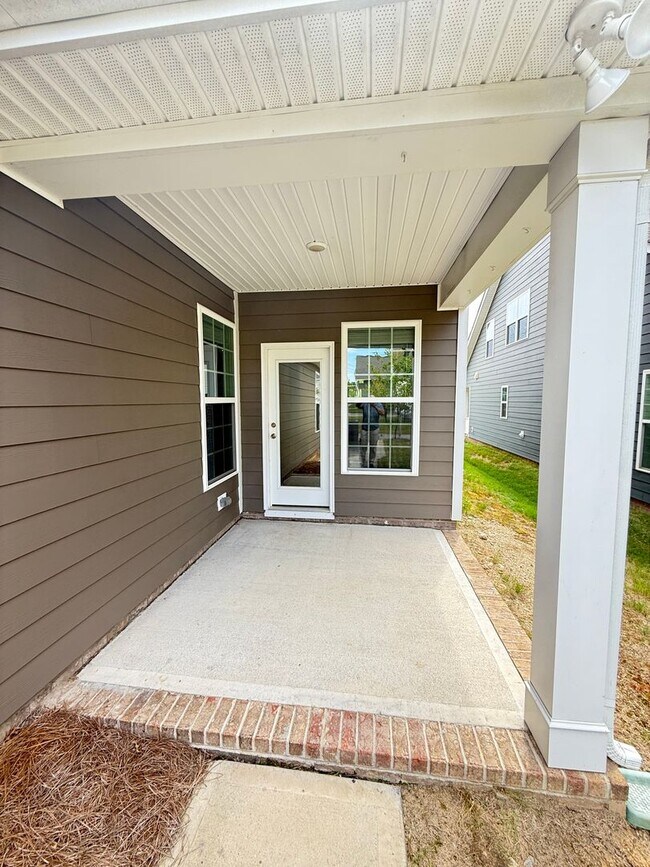 Building Photo - Beautiful Westbranch Home with 2-Car Garage, Covered Porch & Greenway Entrance Across the Street