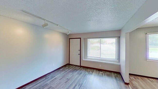 Building Photo - Clean three bedroom one bath duplex with walk out basement with yard looking at trees, across fro...