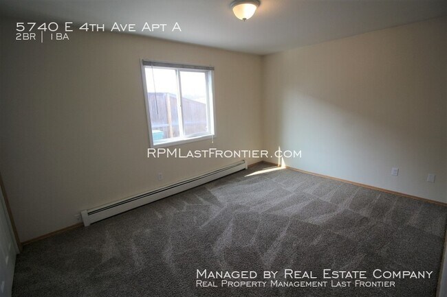 Building Photo - 5740 E 4th Ave