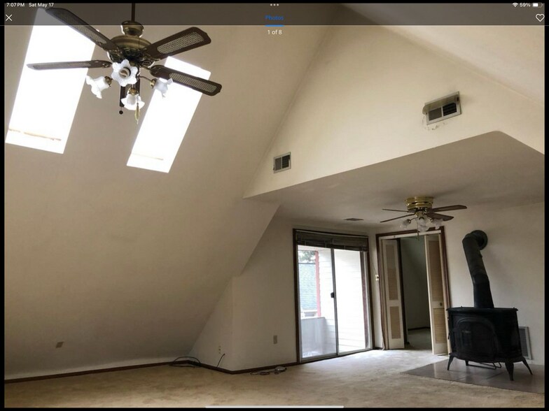 Living room cathedral ceiling with skylight - 1918 E 123rd St