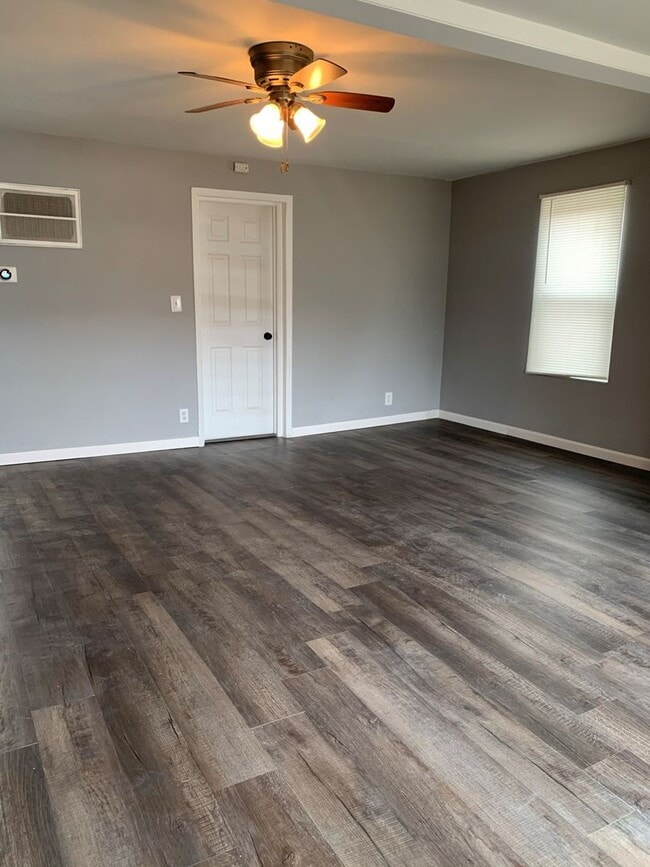 Building Photo - Move-In Ready 2BR Ranch – Fresh Paint, New Floors, & Off-Street Parking!