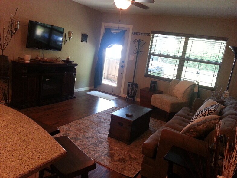 Cozy living room-All units have window treatments - 917 SE 3rd St