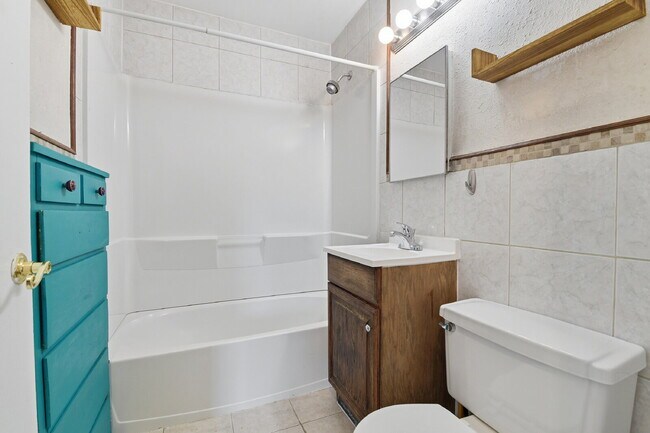 Building Photo - $3,045.95, 3 bed, 2 bath house in Denver with Fenced in Yard and In Unit Laundry!