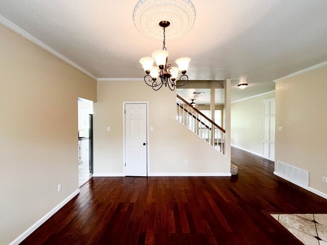 Building Photo - Available NOW!!!! This beautiful 2 story, 4 bedroom, 2 bath, two car garage with garage door open...