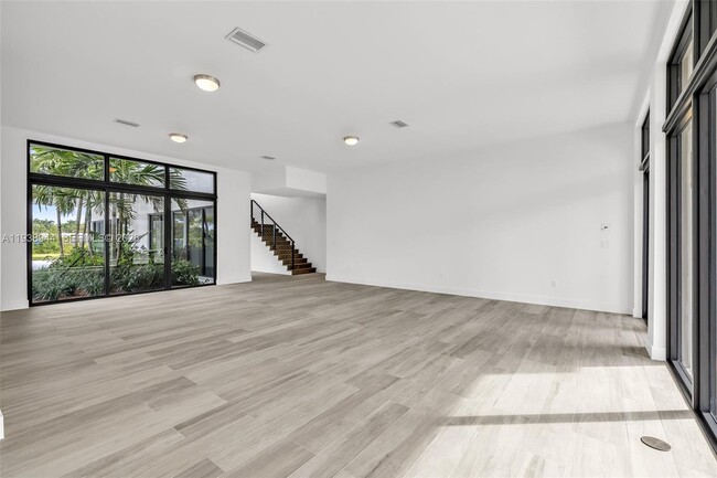 Building Photo - 16699 Botaniko Dr N