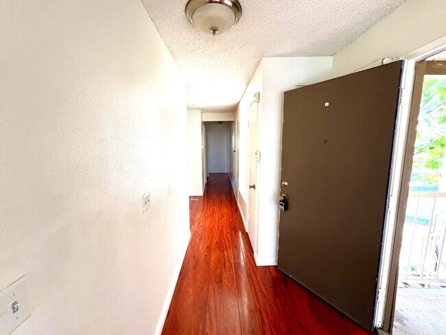Building Photo - 2-Bedroom, 2-Bath Upstairs Condo Unit in Gated Pomona Community, Water/Trash/HOA Included!