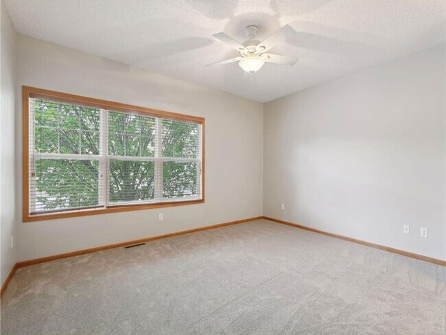 Building Photo - Upscale Townhome with Large Office-Loft, 3 Baths, 2-Car Attached Garage, Quartz Countertops and M...