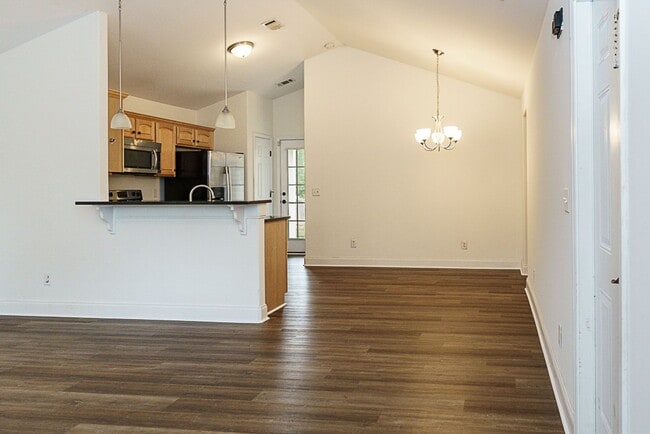 Building Photo - Three Bedroom House with Gated Backyard