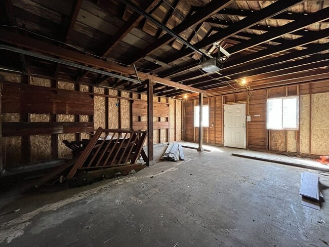 Building Photo - Expansive 4BR 2,900+ Sq Ft Home with Theater-Style Living Room & Bonus Hobby Workshop