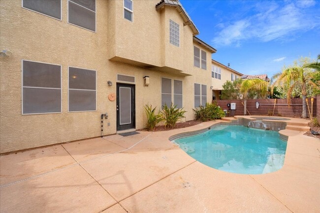 Building Photo - Gorgeous 4 Bedroom Home with Pool, Spa, and Abundant Space in Gated Community