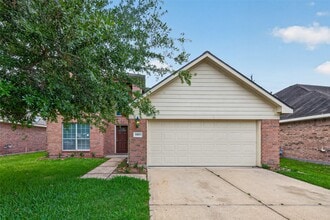 Building Photo - 6915 Great Oaks Shadow Dr