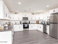Building Photo - 8544 E Plaza Ave