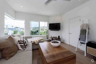 Building Photo - Modern Luxury Fully Furnished Townhome wit...