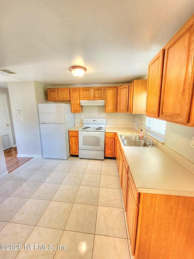 Building Photo - 10881 Key Coral Dr