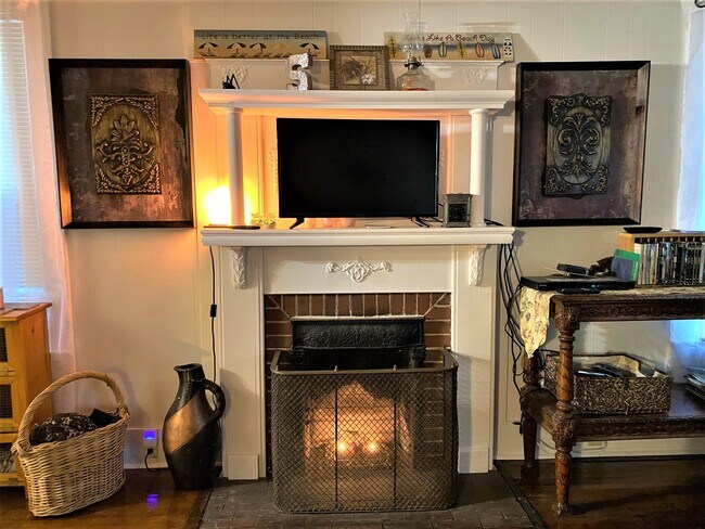 fireplace area - 211 S Navy Blvd