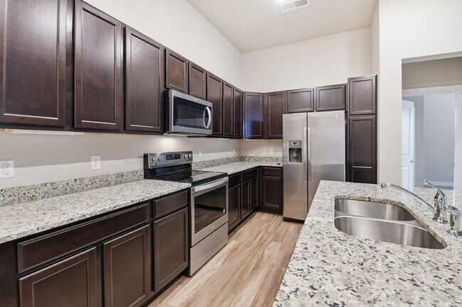 Building Photo - $1,640.95, 2-bed, 2-bath condo located in Aurora.