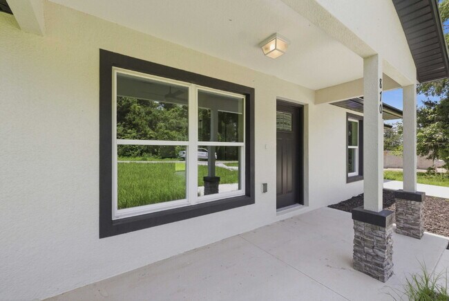 Building Photo - Available Now! New 3/2 Home with Large Backyard and Front Porch