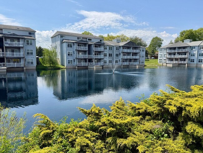 Building Photo - Welcome to Waters Edge Condos!