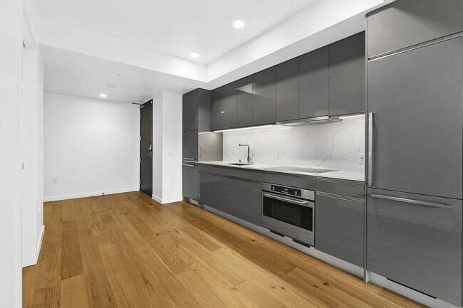 Building Photo - Nexus Condominium - 1 bedroom + den