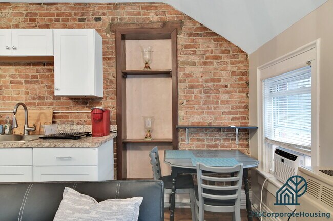 Building Photo - Furnished 1-Bedroom Upper Apartment on Prospect Ave