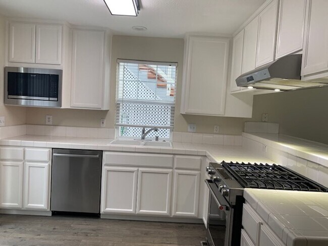 Building Photo - ~4 Bedroom 2.5 Bath House ~ Includes Water & has Solar ~ Huge Savings on Utilities ~