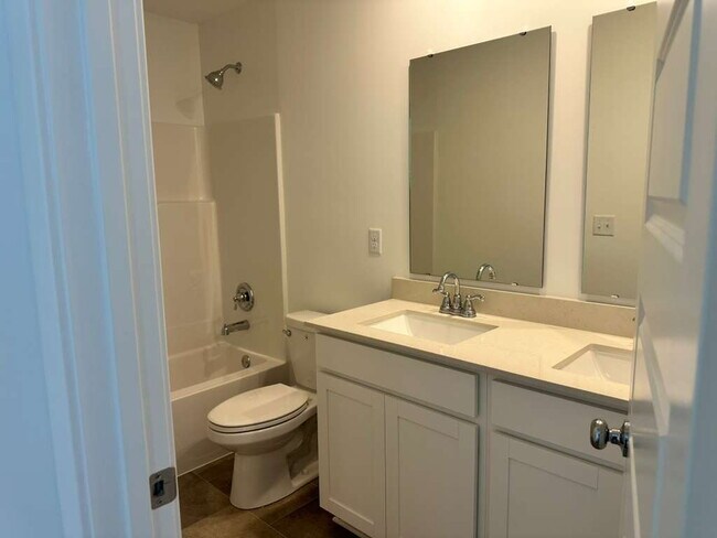 Building Photo - Beautiful new construction featuring 4 bedrooms and 2.5 baths, ideally located just minutes from ...