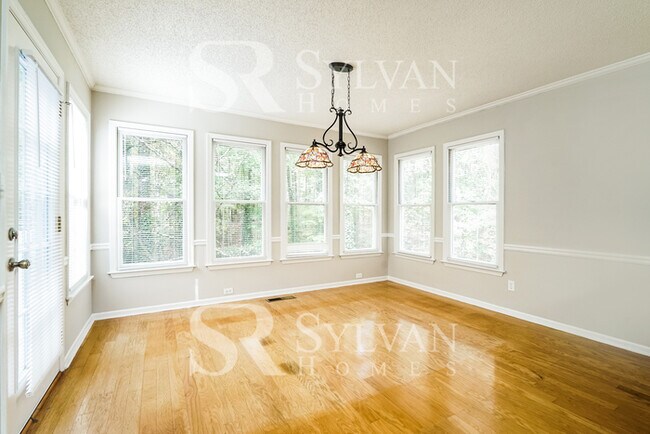 Building Photo - The living is easy in this 4 bedroom, 2.5 ...