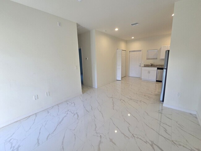 Building Photo - Brand-New Modern 2BR/1BA Home – Desirable Lehigh Location