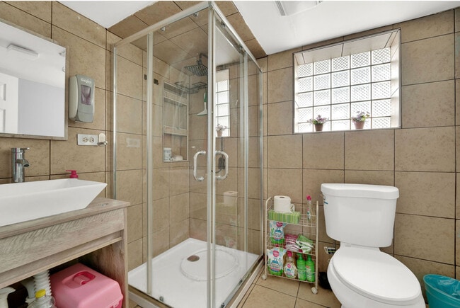 Building Photo - 9427 S Utica Ave