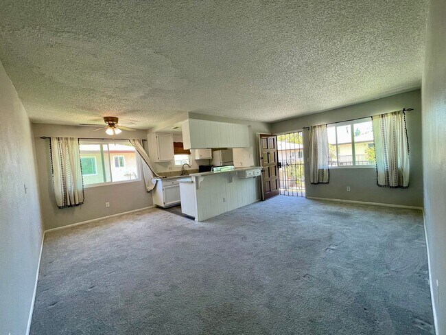 Building Photo - 2 bedrooms, 1 bath with carport Home is Close to the 52, 67 and 125 freeways, shopping and restau...