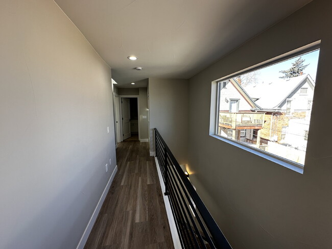 Building Photo - "Spacious & Stylish Duplex Oasis: 2 Bed, 2...