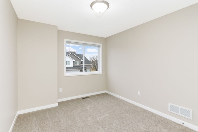 Building Photo - Otsego Townhome for RENT 3bd3ba2gar INTERIOR UNIT available May 01