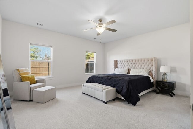 Building Photo - Stunner! This beautiful home features a spacious open floor plan with primary suite and private o...