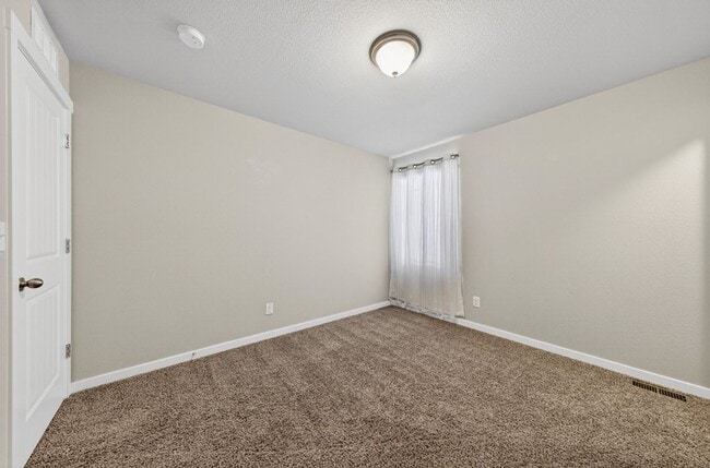 Building Photo - Upgraded 4-Bedroom Corner Lot Home with Mountain Views