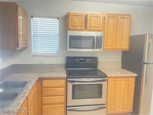 Building Photo - 5055 W Hacienda Ave