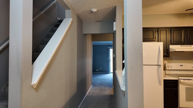 Building Photo - Spacious 2-Bed Townhome with Finished Basement, Pond View & Attached Garage in Fairfield